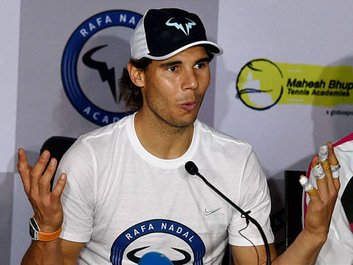Spain's Rafael Nadal addressing the press at a promotional event in New Delhi on Thursday. PTI