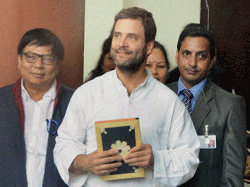Congress Vice President Rahul Gandhi with Chief Minister Tarun Gogoi and other party members after a programme with Self Helped Group at GMCH Auditorium in Guwahati on Friday. PTI Photo.