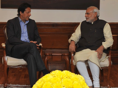 Imran Khan and Prime Minister Narendra Modi. Image courtesy Twitter.