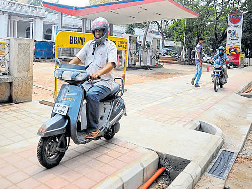 Motorists ride on the TenderSURE footpath on St Mark's Road in the City.  DH photo