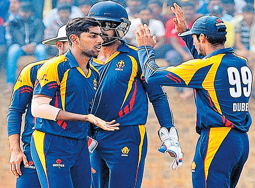 PLAYING LONE HAND: J Suchith's all-round show (4/35&34) for Karnataka went in vain. DH PHOTO