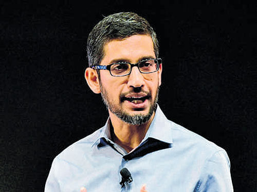 Google CEO Sundar Pichai gestures during a news conference in New Delhi on Wednesday. PTI