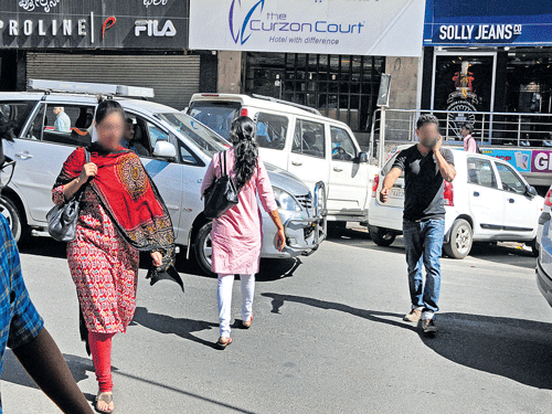 poor infrastructure Pedestrians say that lack of proper zebra crossings have led to jaywalking. DH&#8200;PHOTO&#8200;BY&#8200;SK&#8200;DINESH