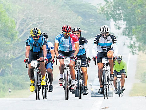 The members of 'Tour of Nilgiris' team arrive in Madikeri  on Thursday evening. DH photo