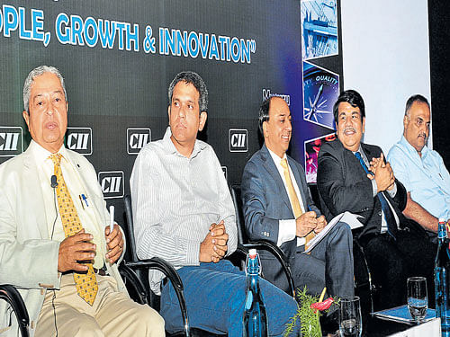 Yuken Indian managing director C P Rangachar, Foley Designs managing director Michael Foley, Mahindra and Mahindra chief purchase officer Hemanth Sikka, CII-Mysuru chairman  N Muthukumar, District Industries Centre Joint Director H Ramakrishne Gowda during the  inaugural ceremony of the manufacturing conclave in Mysuru, on Thursday. DH photo