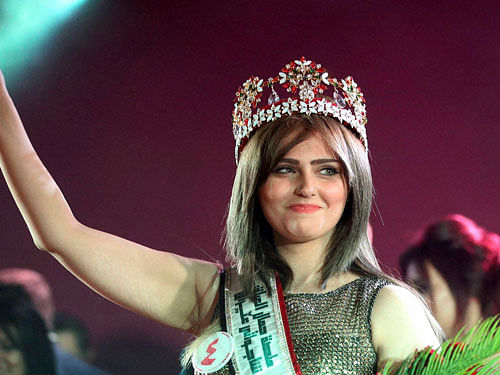 Newly crowned Miss Iraq, 20-year old Shaima Qassim, celebrates after being crowned at the end of the 2015 Miss Iraq Final in Baghdad, Iraq, Saturday, Dec. 19, 2015. AP/PTI