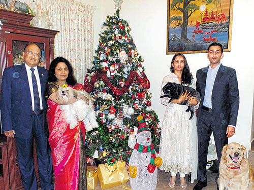 CHRISTMAS NOW(Fromleft) Dr Paramesh, Elizabeth, Rashmi and Roshan at their home in RMVII Stage.