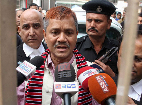 ULFA General Secretary Anup Chetia interacting with media persons after being produced at District & Sessions Court in Guwahati on Monday. PTI Photo