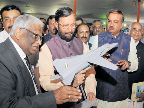 Union Minister for Environment and Forests Prakash Javadekar and Union Minister for Chemicals and Fertilisers H&#8200;N&#8200;Ananth Kumar look at models on display at an exibition organised as part of Chetana Seva Utsava 2016 in Bengaluru on Thursday. DH&#8200;photo