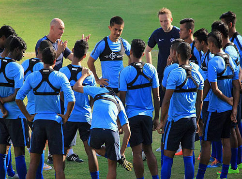 Indian football coach Stephen Constantine give instructions to players during a practice session in Thiruvananthapuram on Saturday. India will play against Afghanistan during the SAFF Suzuki Cup on Sunday. PTI Photo