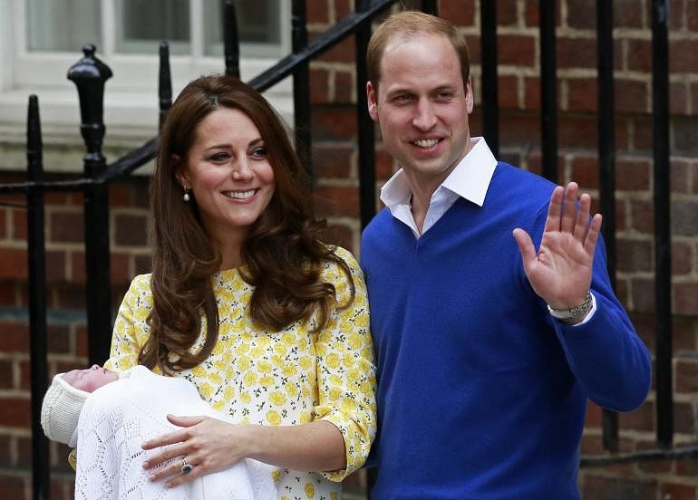 Prince William with his wife and baby daughter - Reuters file photo
