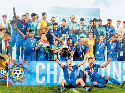 ON CLOUD NINE: Victorious Indian team members celebrate with SAFF Cup in Thiruvananthapuram on Sunday. PTI