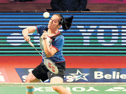 Awadhe Warriors' Sania Nehwal returns during her win over PC Thulasi of Delhi Acers on Monday. PTI