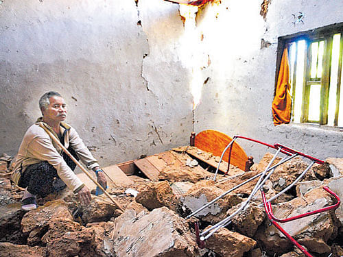 The remains: Bongamlung, a 54 -year-old farmer from Longmai village in Manipur, very close to the quake  epicentre, saw his house crumbling in seconds after the jolt.  Deepak Oinam
