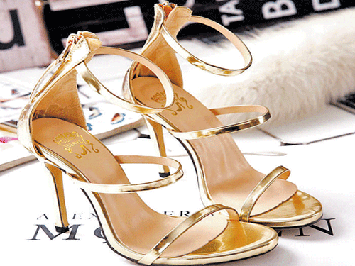 Be the talk of the party with these stylist golden 'strappy' stilettos. Price:  1,699 Where: Ni Hao! Fashion