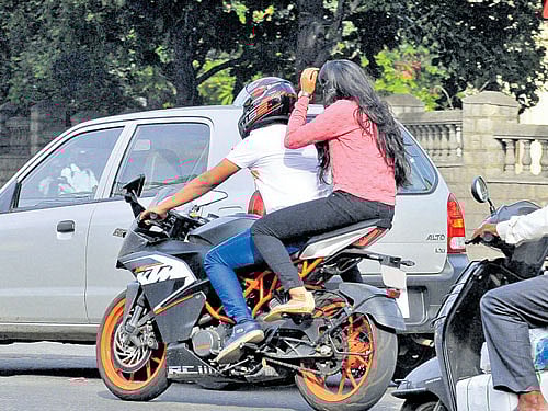 Helmetless pillion riders, take it easy for 15 days