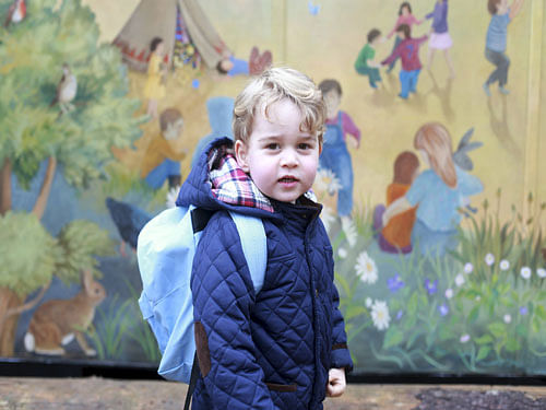 Britain's Prince George stands outside the Westacre Montessori School nursery in King's Lynn, reuters photo
