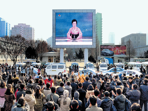 ecstatic crowd: In this photograph released by North Korea's official Korean Central News Agency (KCNA) on January 6, 2016, North Korean people celebrate the success of the first hydrogen bomb test in Pyongyang. The isolated country's strategy is to up the ante, and hope the world will acknowledge it as a nuclear weapons power that has to be dealt with. AFP