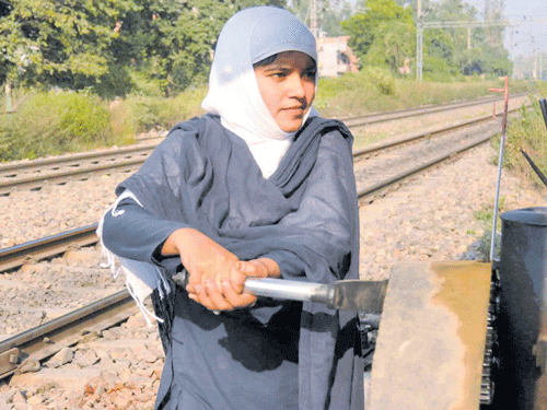 L Salma Beg at work near Malhaur railway station.