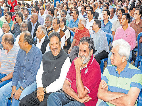 all smiles Old students of St Joseph's Indian Institutions. Mohandas Pai (second from right) is also seen. DH Photos by SK Dinesh
