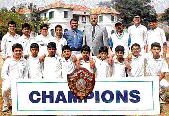 Champions: Bishop Cotton Boys' School, winners in the under-15 category of the Cottonian Shield in Bengaulru on Wednesday. STANDING (From left): Tanuj M, Harshavardhan, Muhammed S, Aneesh, Anil Dutt (Sports Director), John K Zachariah (Principal), Ramdas KS (coach), Abhinav, Suraj MS. KNEELING: Anvith K , Rahul K , Pranav B, Amogh, Tarun KC, Likith T , Bradlee B, Varun C, Raghav K. DH PHOTO