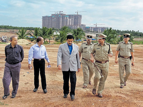 V Shankar, Deputy Commissioner of Bengaluru Urban district, during the inspection of a site. DH FILE PHOTO