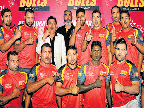 strong bulls Bengaluru Bulls' players  at the team launch on Thursday. Standing (from left):&#8200;Vijender Singh, Deepak Rathee, Surjeet Narwal (captain), Randhir Singh (coach), Uday Sinh Wala (CEO of Kosmik Sport League Pvt Ltd), Deepak Dahiya, Sreekanth Tewthia, Ashish Sangwan, Amit and P Satish. Front row:&#8200;Shashank Wankhede, Ramavath Pandu, Parmod Narwal, Vinoth Kumar, Preetam and Vaibhav Kale. DH Photo