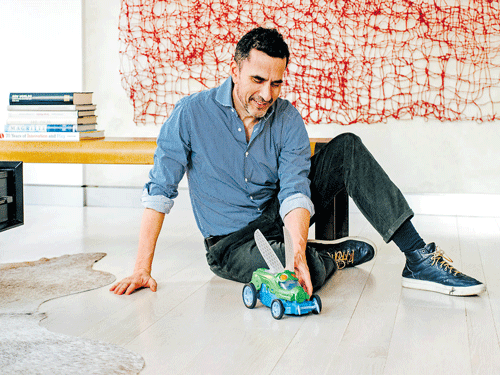 buzzing ahead: Robert Schwartzman, the president of Pace Development Group, with Mattel's new Bug Racer (inset). After years of sagging sales, executives trot out the Bug Racer as one of the quirkier signs that the 70-year-old company is no longer a grandmother's toymaker. nyt