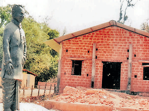 remembering icons: The community hall under construction in the memory of Shantaveri Gopala Gowda at Kallur in Thirthahalli, Shivamogga district. (Right) Late Chief Minister Kengal Hanumanthaiah. DH PHOTOS