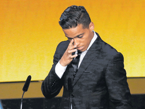 among the stars: Brazilian Wendel Silva Lira speaks after receiving the Ferenc Puskas award for the best goal. AFP