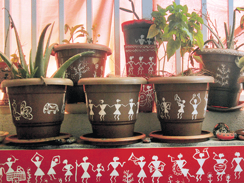 INTRICATE Pots with warli art and (below) some of Poornima's other works.