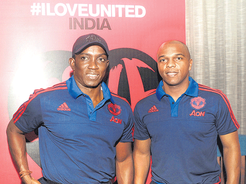 red devils: Former Manchester United players Dwight Yorke (left) and Quinton Fortune at a promotional event in Bengaluru on Sunday . DH Photo/ kishor Kumar bolar