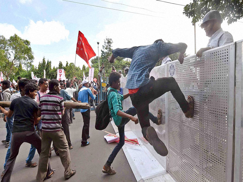 The protest turned violent as students tried to jump over barricades and attacked security personnel causing injuries prompting the police to use water cannons and detain students. PTI file photo. For representation purpose