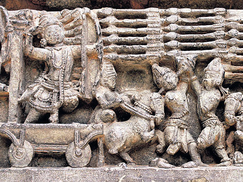 intricate A war scene carved on the wall of Hoysaleshwara Temple in Halebid.  PHoto by author