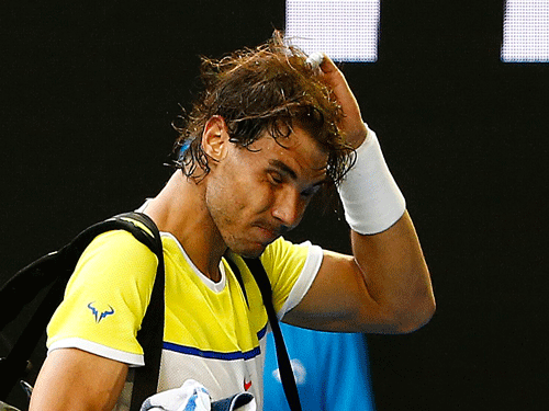 Spain's Nadal reacts as he leaves after losing his first round match against Spain's Verdasco at the Australian Open tennis tournament at Melbourne Park, Australia. Reuters Photo.