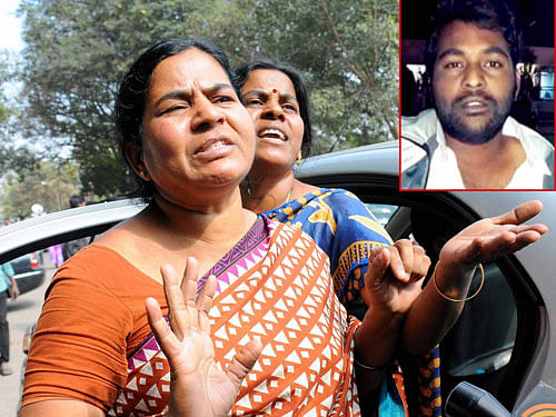 Mother of Rohith Vemula (inset), a doctorate student at the Hyderabad Central University who was found hanging in a hostel room, speaking to media about his son's depression at Osmania General Hospital in Hyderabad on Monday. PTI Photo