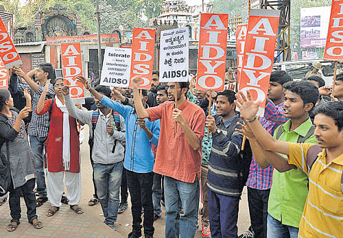 Students, under the banner of AIDSO, stage a protest at the Mysore Bank circle in the City on Tuesday, condemning political  interference in the affairs of the University of Hyderabad that led to the suicide of research scholar Rohith Vemula. dh photo