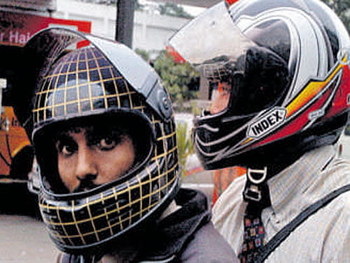 The police decided to enforce the rule from January 20 after conducting campaigns for about two weeks to create awareness about the Supreme Court order and the importance of both the rider and the pillion wearing helmets. The rule also applies to children aged 12 years and above. DH file photo
