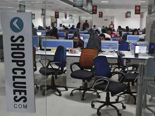 Employees of Shopclues.com, an online marketplace, work inside their office in Gurgaon, on the outskirts of New Delhi, India, Reuters file photo