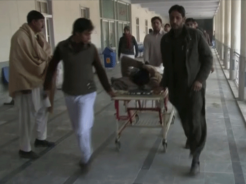 People wheel a man injured in a militant attack at Bacha Khan University, at a hospital in Charsadda, northwestern Khyber Pakhtunkhwa province, Pakistan in this still image taken from a video January 20, 2016. Reuters Photo.