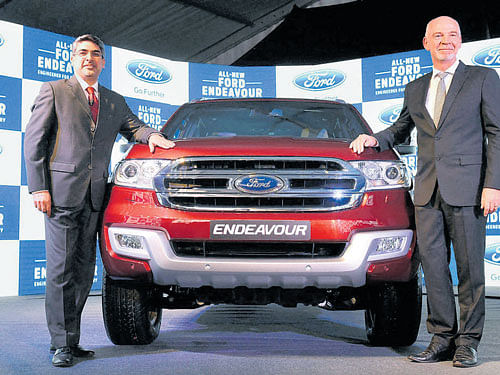 Ford India  Executive Director for Marketing, Sales & Service  Anurag Mehrotra (left) and Ford India Managing Director and President Nigel Harris unveil the new Ford Endeavour in Mumbai on Wednesday. PTI