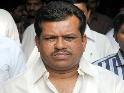 Labour Minister P T Parameshwar Naik
