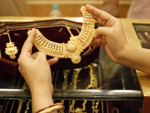 Globally, gold fell by .31 per cent to USD 1,098.00 an ounce and silver by 0.67 per cent to USD 14.00 an ounce in New York in yesterday's trade. file photo