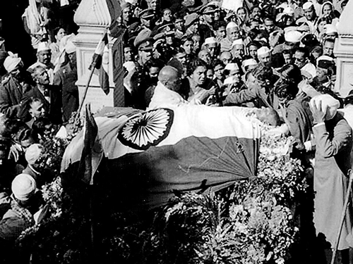 Moments after he was shot by Godse; his body lying in state at Birla House, with his chest left uncovered displaying the gunshot wounds; his last journey.   Photo courtesy: Anand kumar bhowmick & 'let's kill gandhi!' by tushar a gandhi