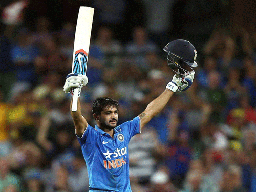 India's Manish Pandey Mann celebrates after he hit a century during their One Day International cricket match against Australia in Sydney, Australia. Reuters Photo.