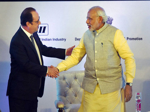 Addressing India-France Business Summit here after Hollande spoke, Modi said the French President 'is correct' in saying that terrorism is a challenge just like global warming. PTI photo