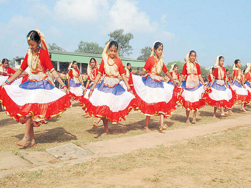 Students present a cultural programme on the occasion of 67th Republic Day in Madikeri on Tuesday. DH photo