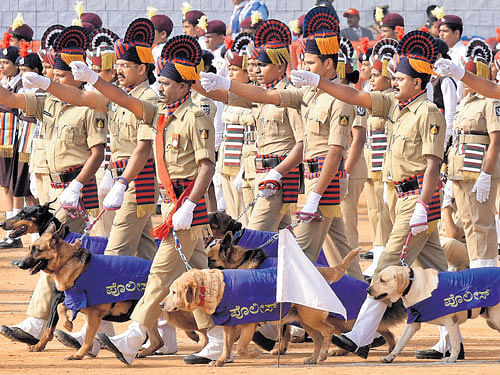 The police dog squad takes part in the march past during the Republic Day parade at the Manekshaw Parade Ground in the City on Tuesday. DH photo