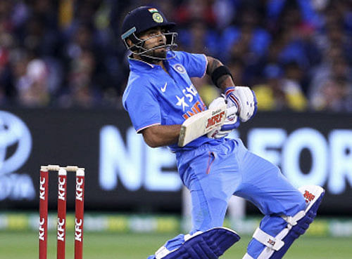 Virat Kohli batting against Australia during their T20 cricket match at the Melbourne Cricket Ground. Reuters photo