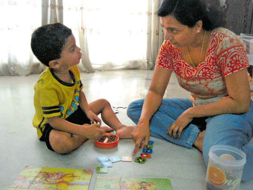 supportive Sandhya Viswan with son Omkar.